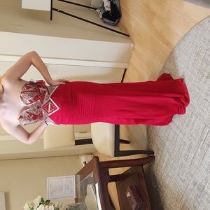 Size 2 red with silver accent trumpet gown, with clear straps NWT by Xcite